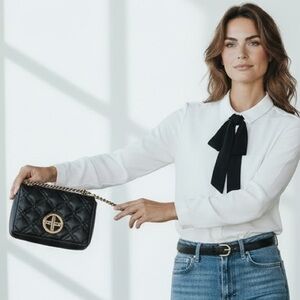 kate spade Black crossbody purse with gold accents